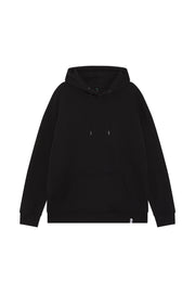 Front of unisex black organic cotton hoodie in a relaxed drop shoulder fit