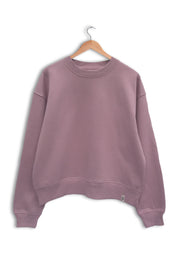 Front of women's organic cotton drop shoulder sweatshirt in dusty pink