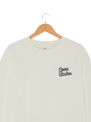 Detail shot of printed women's white organic cotton sweatshirt
