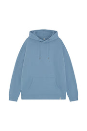 Front of unisex blue organic cotton hoodie in a drop shoulder relaxed fit