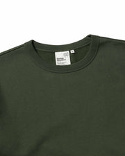 Close up shot of a men's organic cotton sweatshirt ribbed collar with back neck label displaying the brand name Goose Studios