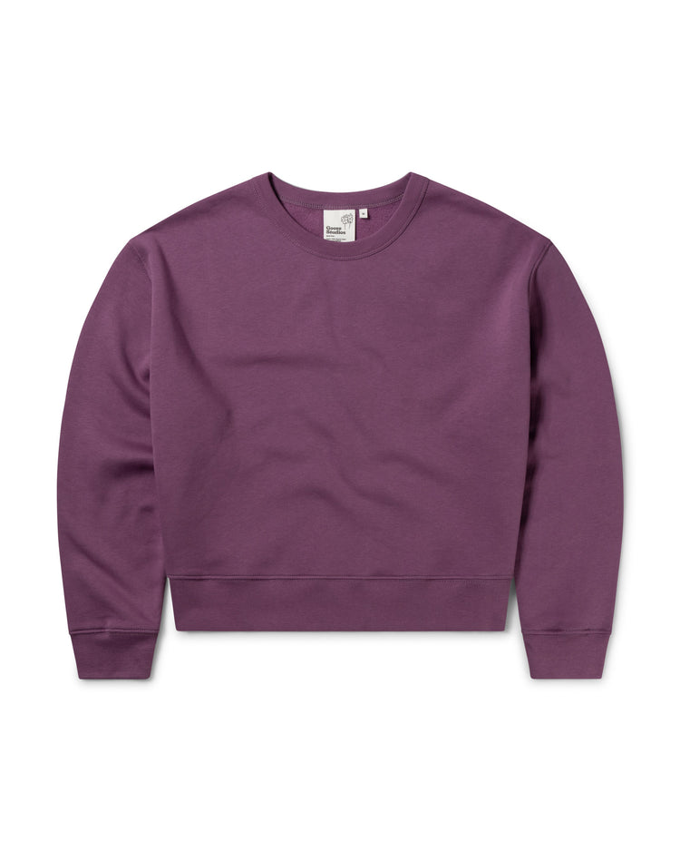 Front of women's organic cotton drop shoulder sweatshirt in berry pink