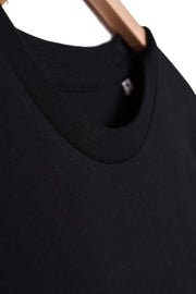 Collar detail of men's black printed organic cotton long sleeve t-shirt