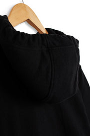 3 panel hood close up shot of men's black organic cotton hoodie