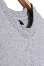 Ribbed collar detailing of men's organic cotton sweatshirt in grey marl.