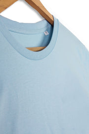 Ribbed collar detail on men's organic cotton t-shirt in sky blue.