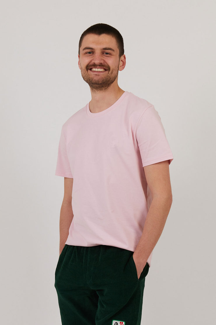 Man wearing pink organic cotton t shirt