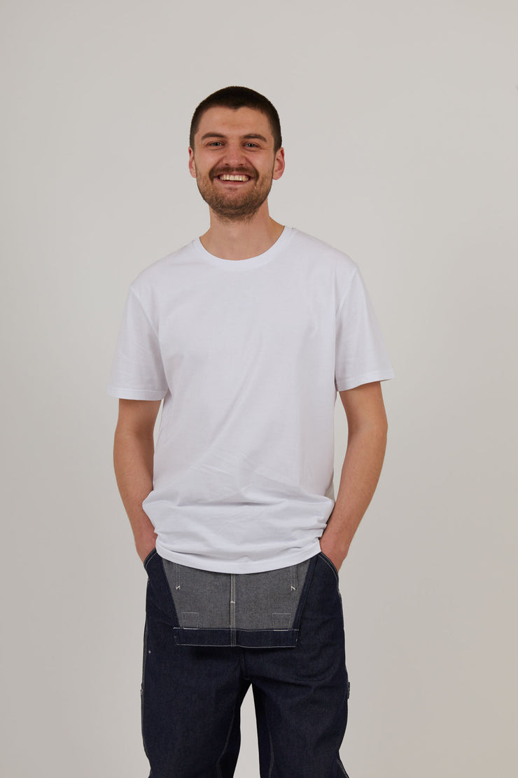 Man wearing white organic cotton t shirt