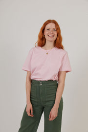 Woman wearing organic cotton pink sustainable t-shirt