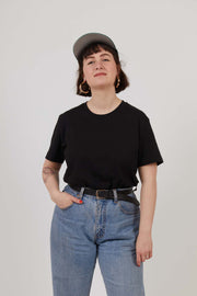 Woman wearing black short sleeve organic cotton t-shirt with crewneck