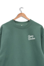 Detail shot of women's organic cotton graphic sweatshirt in green