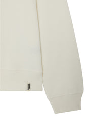 Sleeve detail of women's white organic cotton sweatshirt with ribbed cuffs and hem